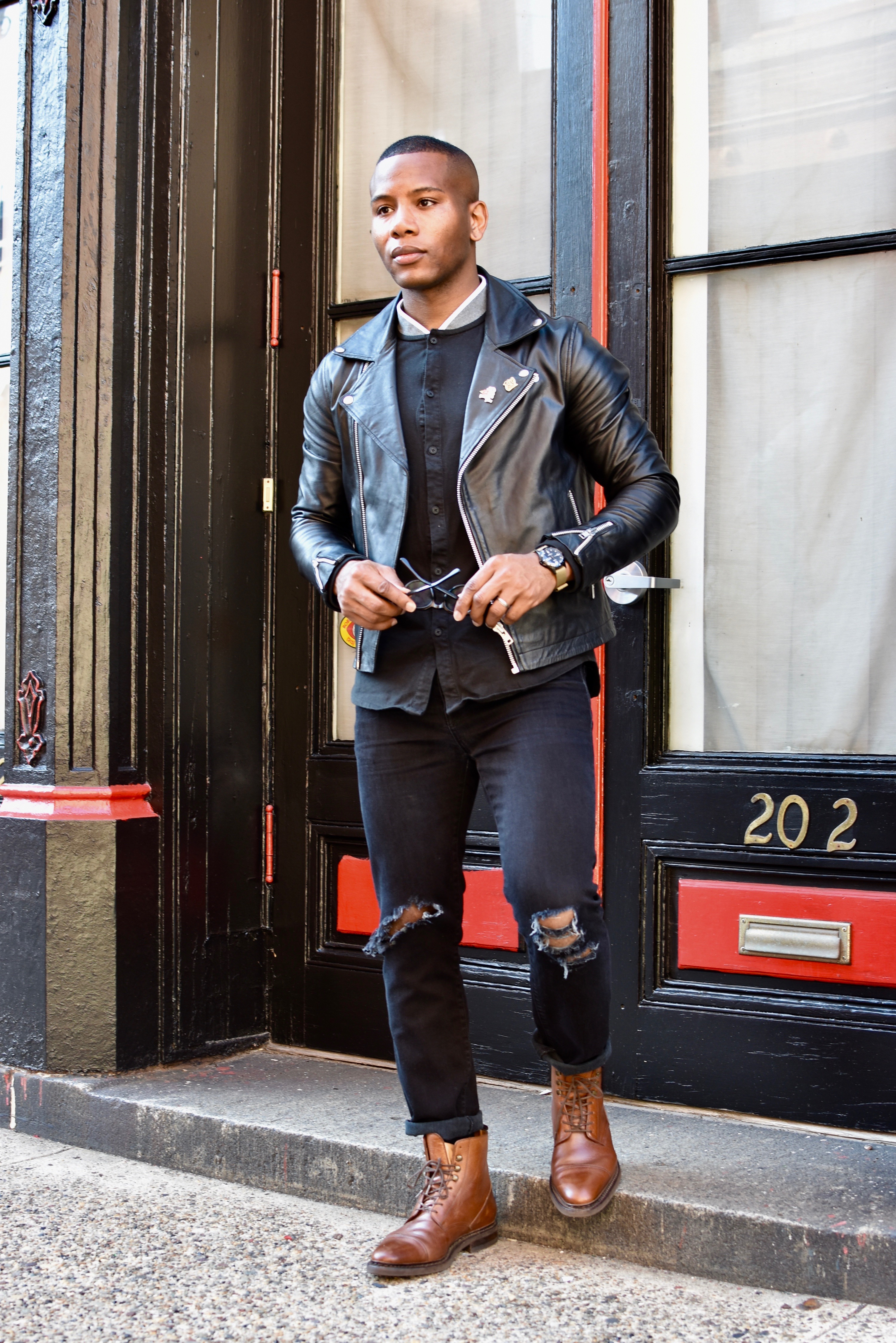Men's Style Pro wearing cobbler union boots & axel arigato sneakers in boots vs sneakers